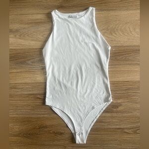 Basic white sleeveless bodysuit